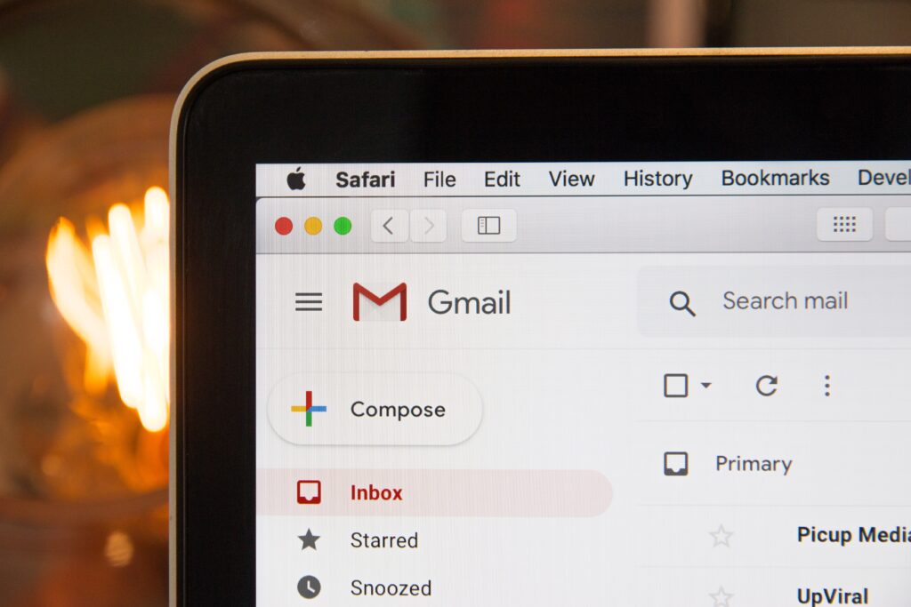 A computer shows a Gmail inbox.